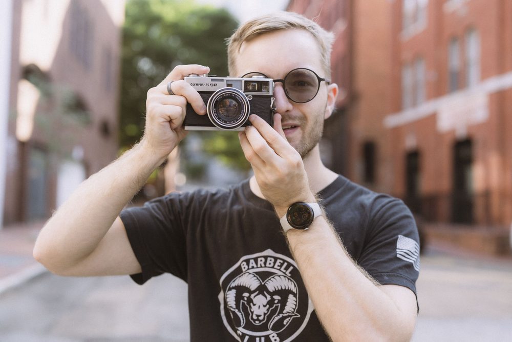 Stephen holding a 35mm film camera